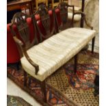 A mahogany framed two seat sofa in the Hepplewhite taste,