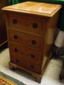 A beech chest of four drawers to bracket feet