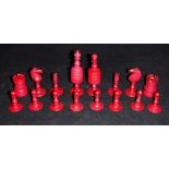 An Anglo Indian carved bone and red-stained bone chess set, height of King, 8 cm, height of pawn, 3.