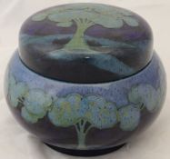 A circa 1930 William Moorcroft "Moonlit Blue" pattern jar with screw cover,