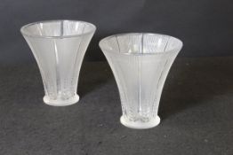 A pair of Lalique glass wild oat or barley decorated trumpet shaped vases raised on a circular foot,