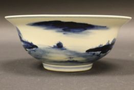 A Chinese blue and white bowl of ogee form,