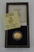 A 1987 Queen Elizabeth II Britannia 1/10 oz proof coin, in case,