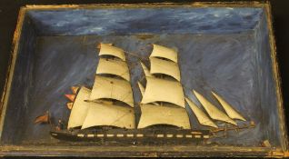 A 19th Century diorama model of a twin-masted ship with cannon, named "Kafir",