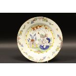 A late 17th or early 18th Century Dutch polychrome Delft charger,