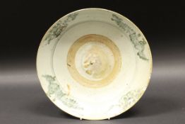 A Chinese (possibly Ming) provincial bowl, the border decorated with floral sprays and Phoenix,
