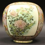 A Japanese Meiji period satsuma ware vase of ovoid form decorated with panels of birds amongst