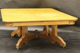 A late Victorian aesthetic oak dining table,