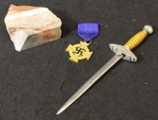 A collection of Third Reich memorabilia relating to Adolf Hitler,
