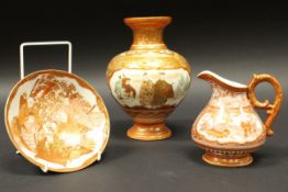 A collection of three Japanese satsuma ware including vase decorated with panels of figures and