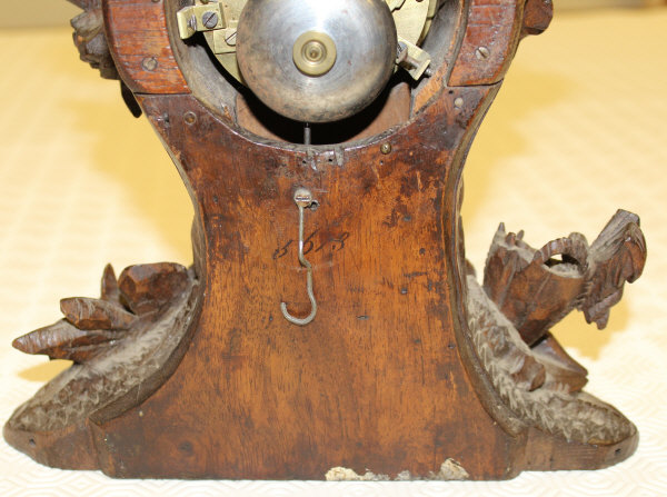 A 19th Century Black Forest type carved cased mantle clock, decorated in high relief with cockerel, - Image 6 of 15