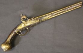 An 18th Century flintlock muzzle loading pistol,