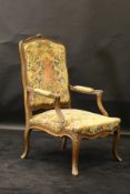 A 19th Century oak elbow chair in the 18th Century Flemish taste,