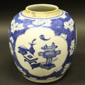 A 19th Century blue and white Chinese ginger jar with three panels decorated with censers,