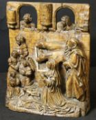 A 15th Century carved limewood relief work nativity scene depicting the infant Christ with Mary,