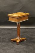 A 19th Century plum pudding mahogany and rosewood cross-banded workbox,