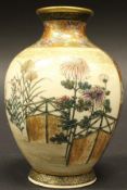 A Japanese Meiji period satsuma ware vase, decorated with figures in a landscape and flowers,