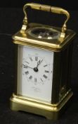 A circa 1900 brass cased carriage clock, the movement by Drocourt, bearing stamp verso,