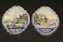 A pair of 19th Century Dutch polychrome Delft ware wall plaques,