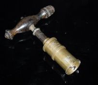 A Victorian brass cylindrical corkscrew by Robert Jones & Son No 2,