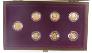 A collection of four Queen Elizabeth II gold sovereigns dated 1958, 1982, 1988 and 2003,