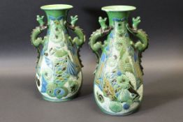 A pair of Edwardian Barum Ware vases by C H Brannam,