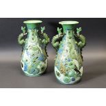 A pair of Edwardian Barum Ware vases by C H Brannam,