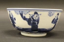 A 19th Century Chinese rice bowl, the main body decorated with figures in a garden setting,