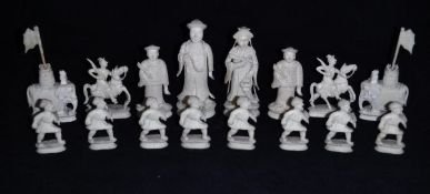 A 19th Century Anglo-Chinese ivory and red stained chess set, Canton circa 1870, height of King,