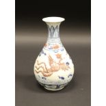 A Chinese (or possibly Vietnamese) polychrome gourd shaped vase with flared rim,