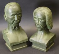A pair of painted wooden busts of a gentleman with moustache and woman,