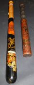 An Edwardian painted wooden truncheon with Royal cypher and crown motif and armorial inscribed