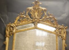 An early 19th Century giltwood and gesso framed pier glass of large proportions,