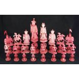 A 19th Century Chinese Canton ivory puzzle ball chess set, natural and red stained,