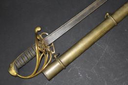 A 19th Century officer's dress sword, the slightly curved blade inscribed "....