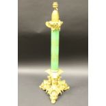 A Victorian gilt brass and milk glass table lamp,