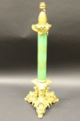 A Victorian gilt brass and milk glass table lamp,