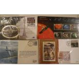 A box containing a collection of various modern first day covers