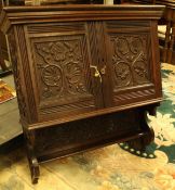 A circa 1900 carved oak two door hanging wall cupboard with shelf CONDITION REPORTS
