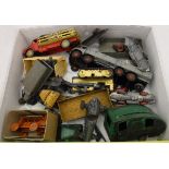 A box containing a collection of various playworn toys including Dinky Supertoys Bedford lorry,