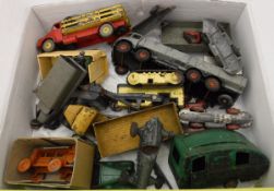 A box containing a collection of various playworn toys including Dinky Supertoys Bedford lorry,