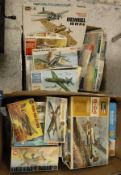 Two boxes of various model kits by Revell, Airfix, Tamiya,