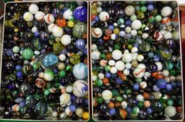 Two tins of various vintage and other marbles