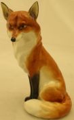A Royal Worcester figure of a seated fox (2993) CONDITION REPORTS Age unknown.