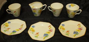 A collection of various china Hollyhock wares and a pottery bowl,