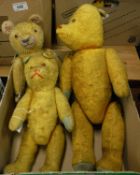 Three early to mid 20th Century gold plush wood wool filled bears,