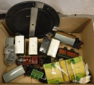 A collection of various Hornby 0 gauge clockwork trains and ephemera including a loco in LMS red,