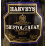 One bottle Bell's Extra Special Old Scotch Whisky 8 Year Old, one bottle Harvey's Bristol Cream,
