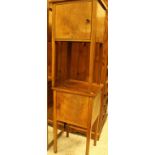 A pair of early 20th Century walnut pot cupboards with single doors on square supports