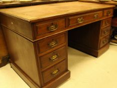 A Victorian walnut double pedestal desk, the writing surface over three frieze drawers,